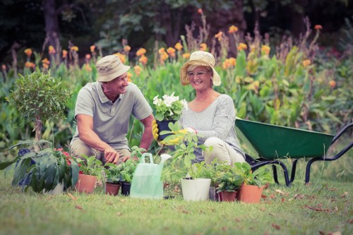 Worker inspecting a garden bed for a complaint